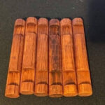 Found This Weird Fuzzy Cone with Bright Red Berries Under My Tree — Is It a Hand Grenade, an Alien, or Something Totally Natural?